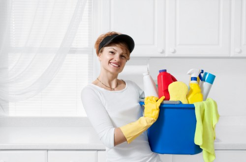 Cleaning team managing furniture access and service limitations